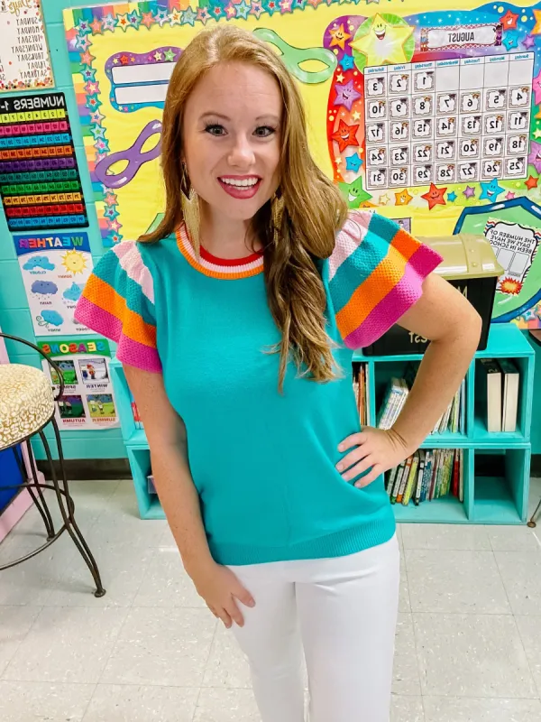 turquoise short sleeve sweater sold by Roxie’s Picks