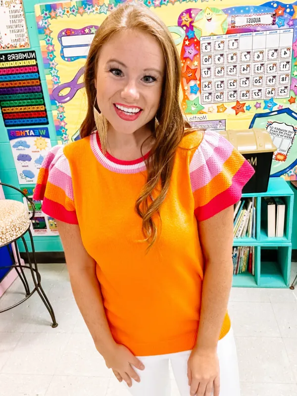 Orange Short Sleeve Sweater sold by Roxie’s Picks