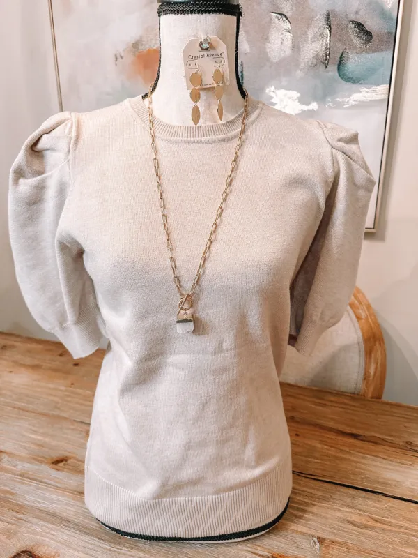 Short Sleeve sweater sold by Roxie’s Picks