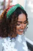 Green & Red Pearl & Rhinestone Top Knot Holiday Headband sold by Roxie’s Picks