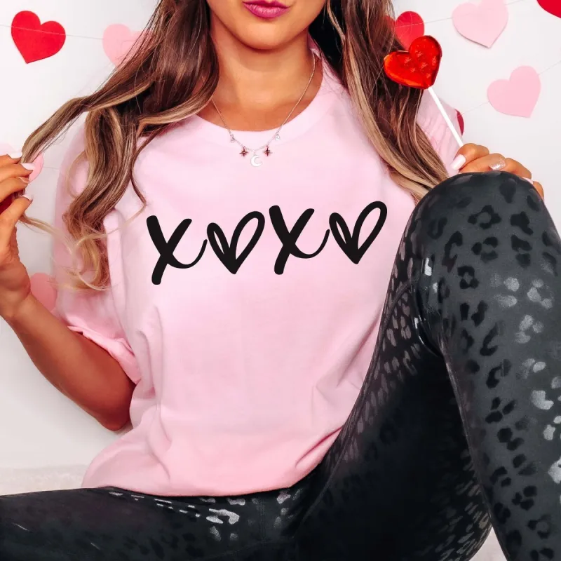 XOXO With Hearts Bella Graphic Tee sold by Roxie’s Picks