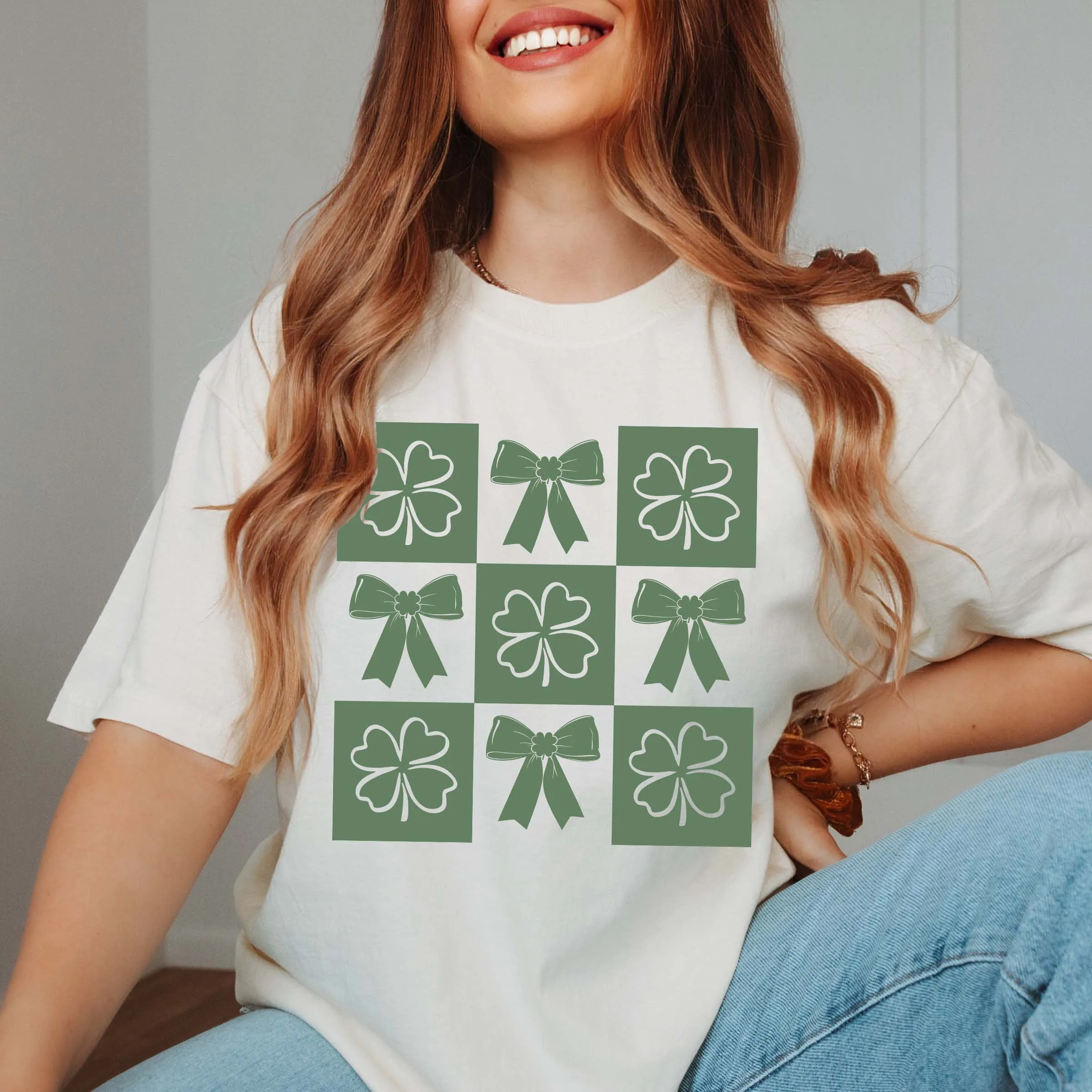 Bow & Shamrock Checkerboard Comfort Color Tee sold by Roxie’s Picks