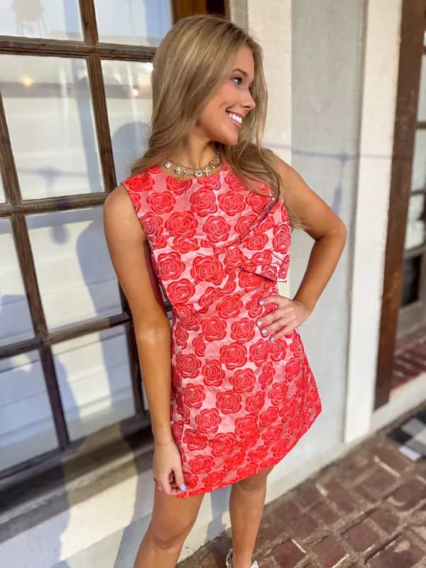 FRONT BOW DETAIL JACQUARD FLORAL SLEEVELESS DRESS sold by Roxie’s Picks
