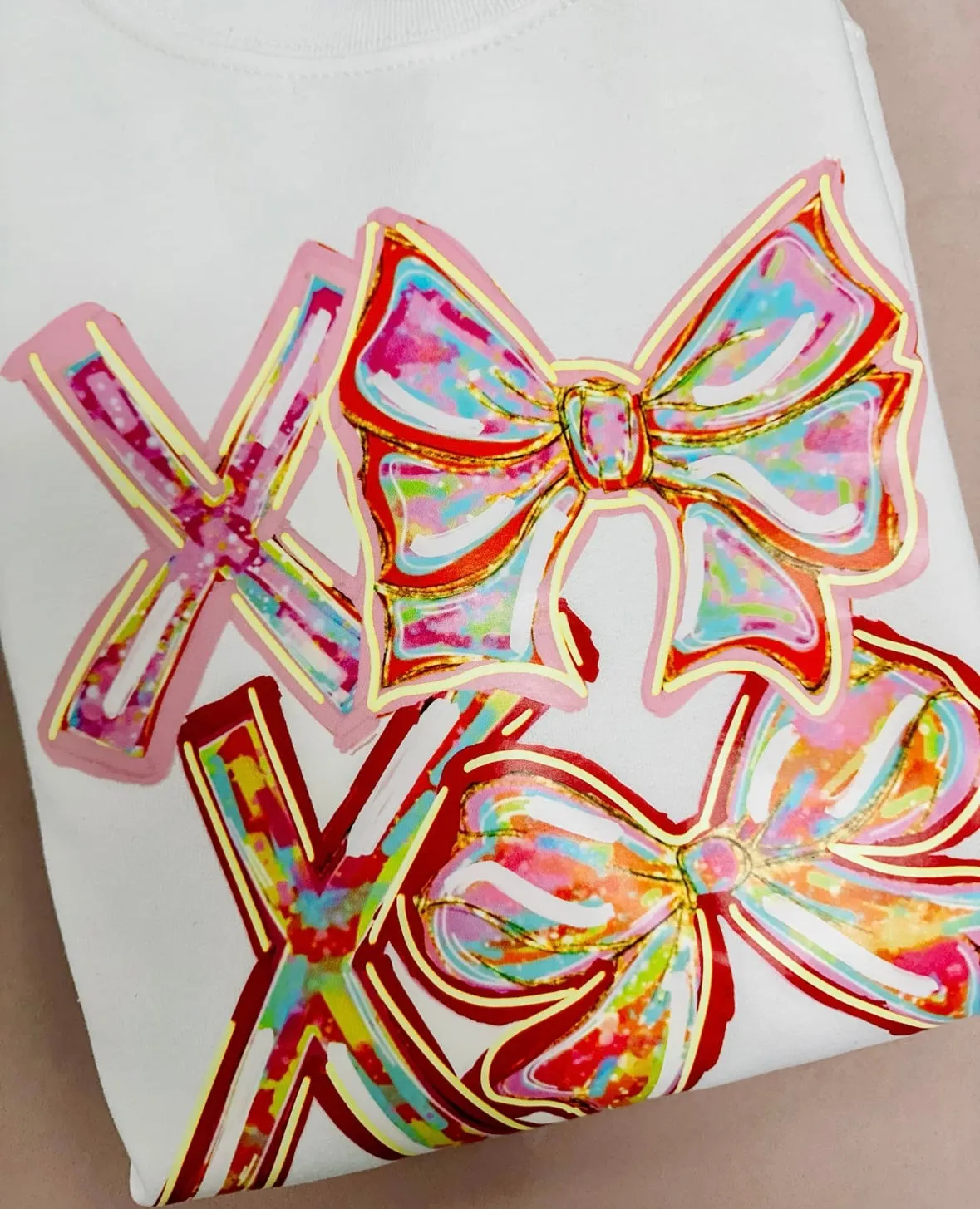 XOXO White sweatshirt sold by Roxie’s Picks