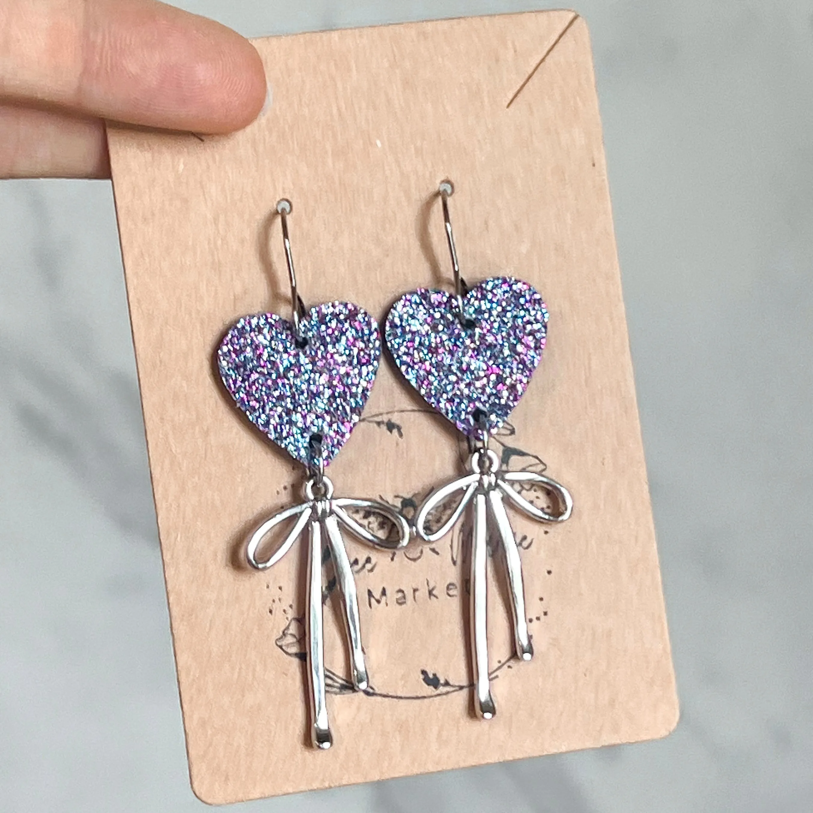 Lauren Lavender Glitter Heart & Silver Bow Earrings sold by Roxie’s Picks product image thumbnail 2