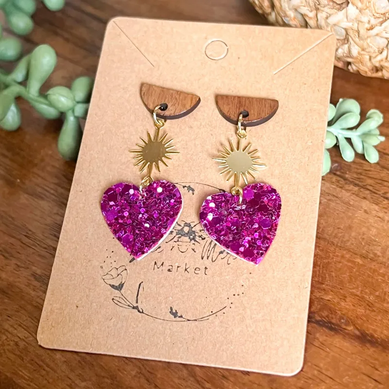 Bursting with Love Glitter Heart Earrings sold by Roxie’s Picks