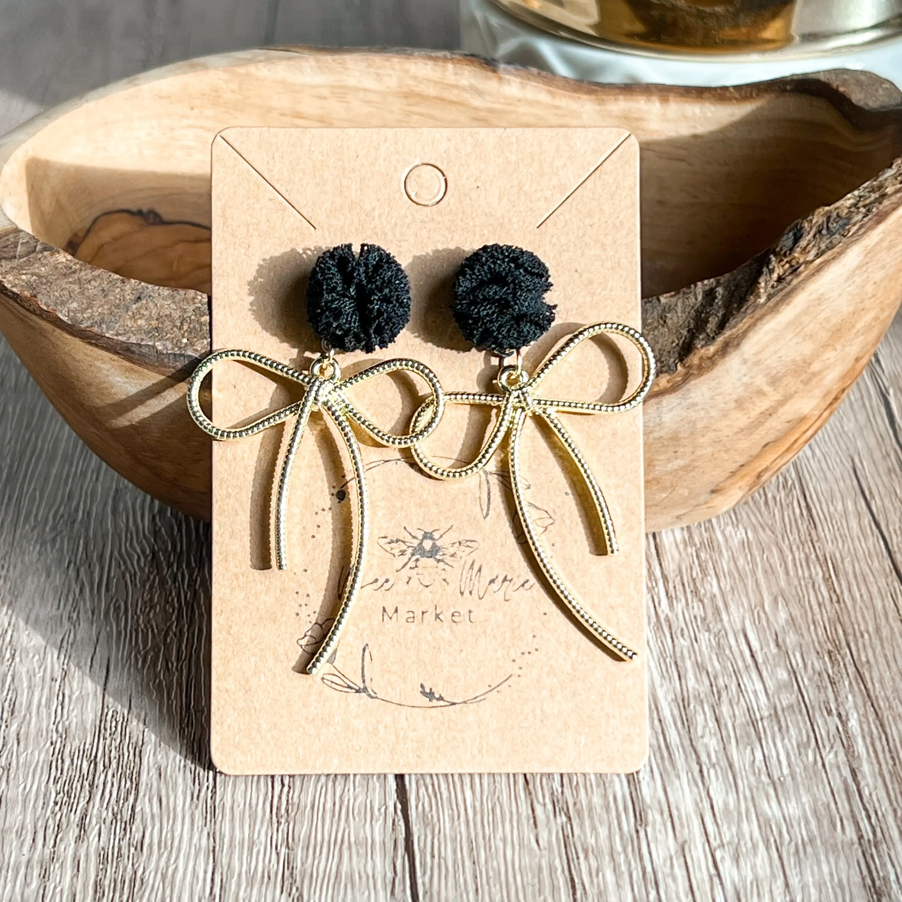 Erica Gold Bow Black Lace Pom Pom Earrings sold by Roxie’s Picks