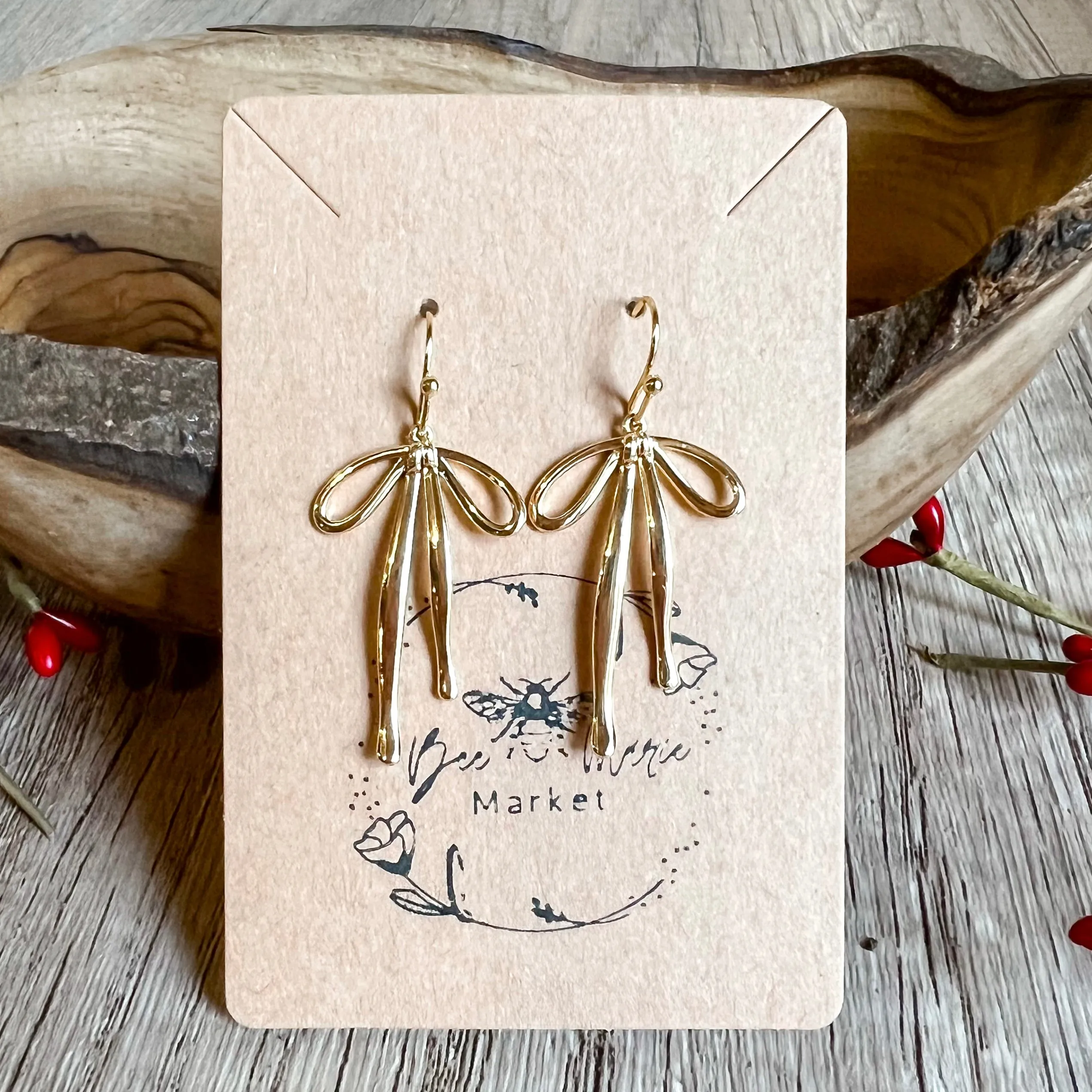 Dana Gold Bow Earrings sold by Roxie’s Picks product image thumbnail 2