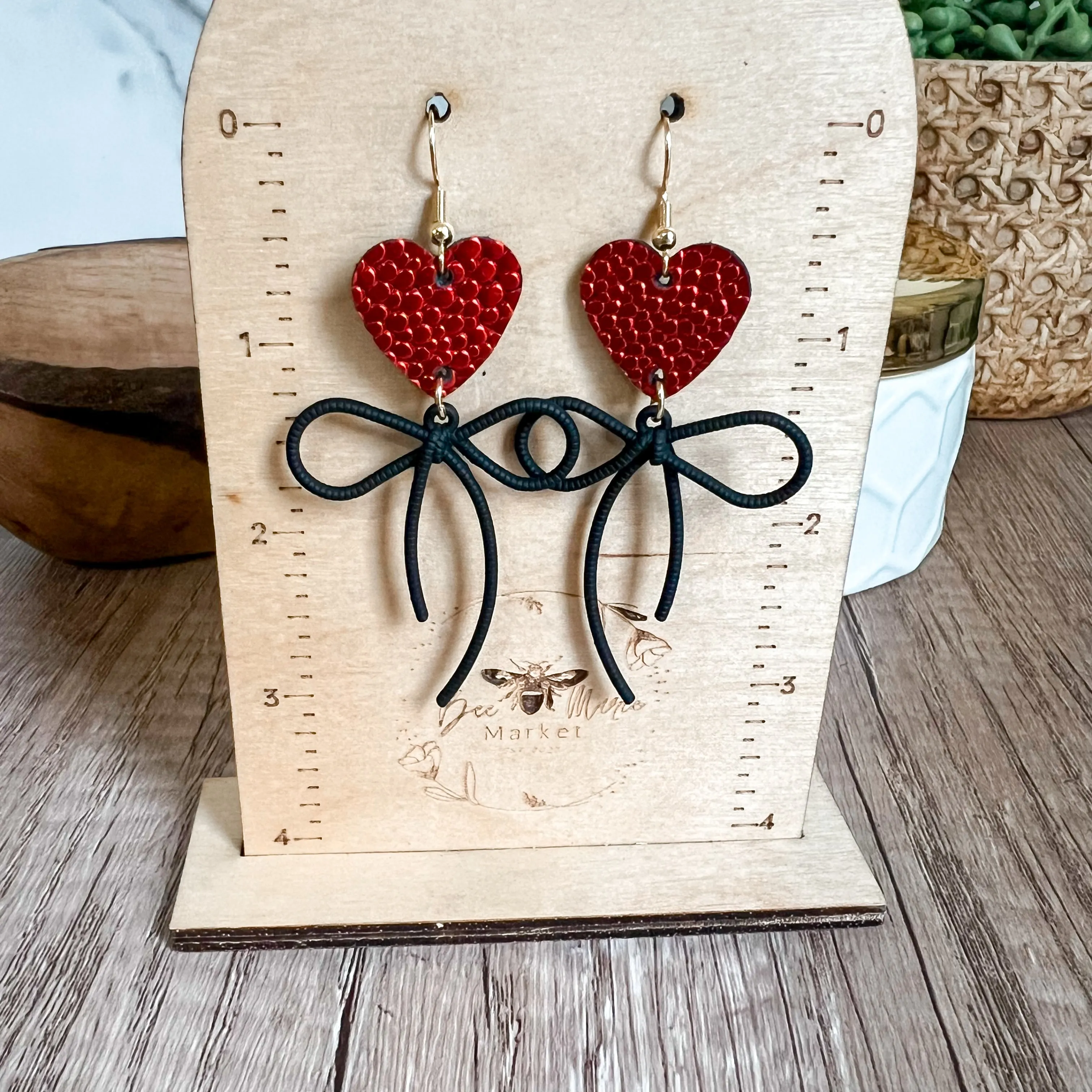 Ruby Red Pebbled Heart & Bow Earrings sold by Roxie’s Picks