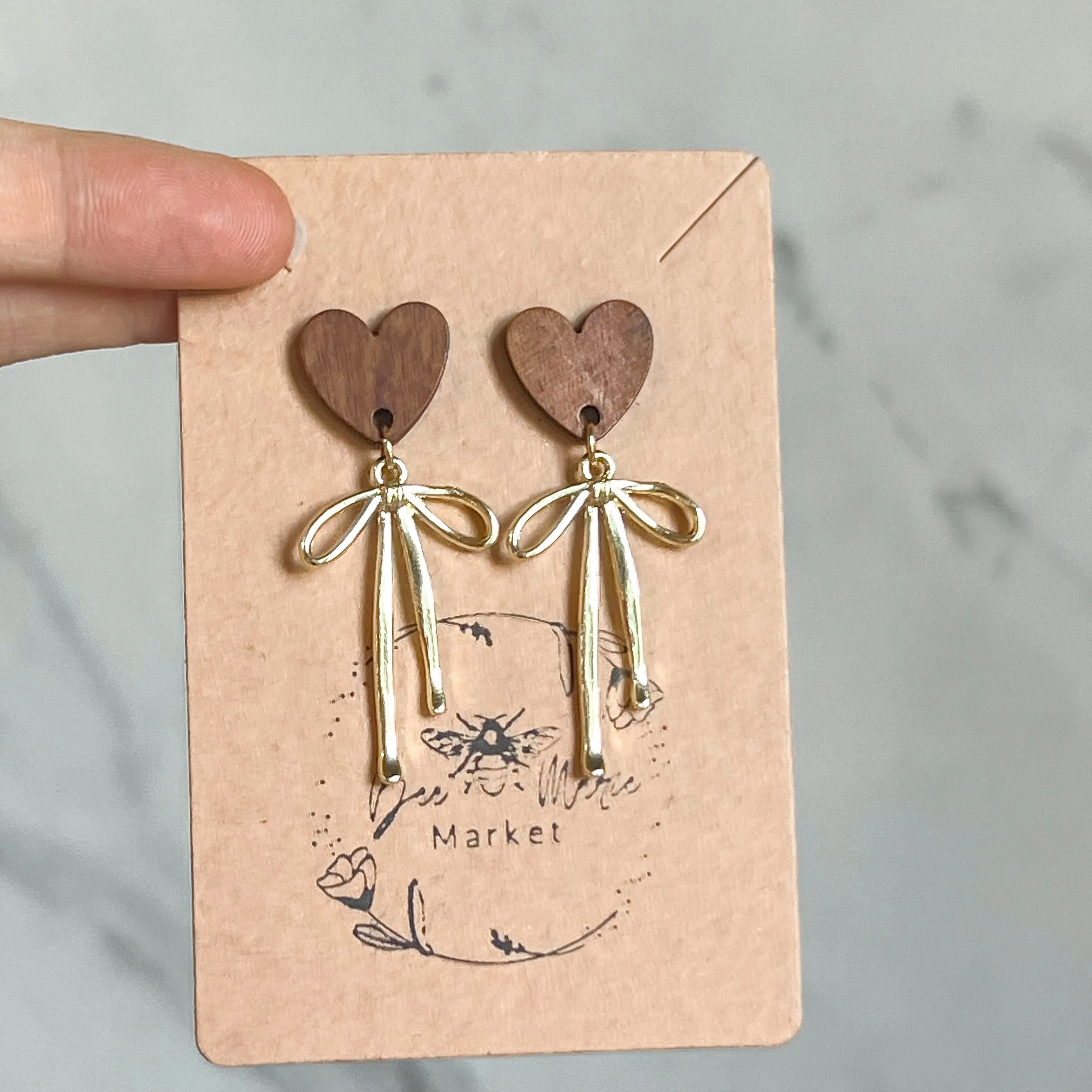 Dana Gold Bow Wood Heart Earrings sold by Roxie’s Picks product image thumbnail 2