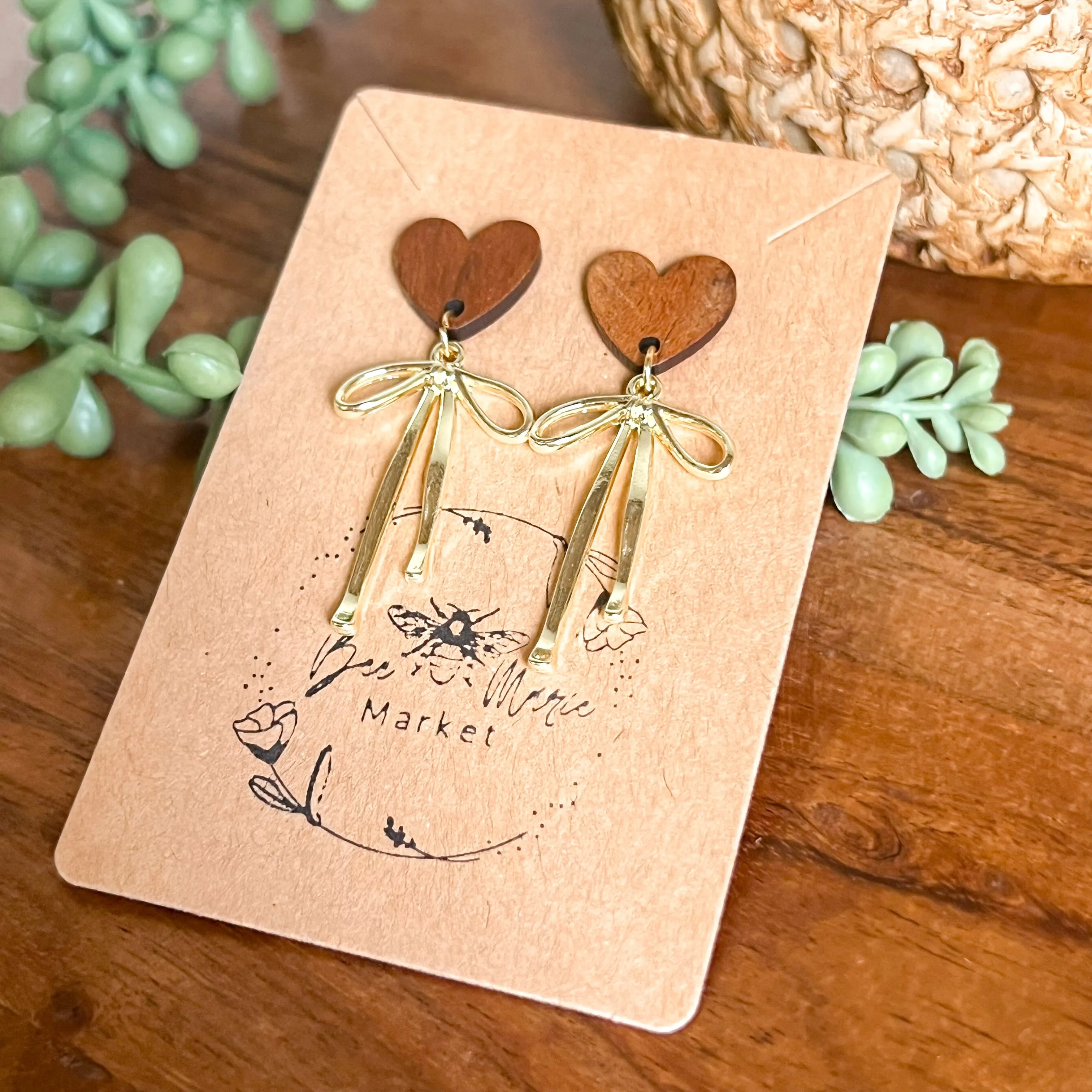 Dana Gold Bow Wood Heart Earrings sold by Roxie’s Picks