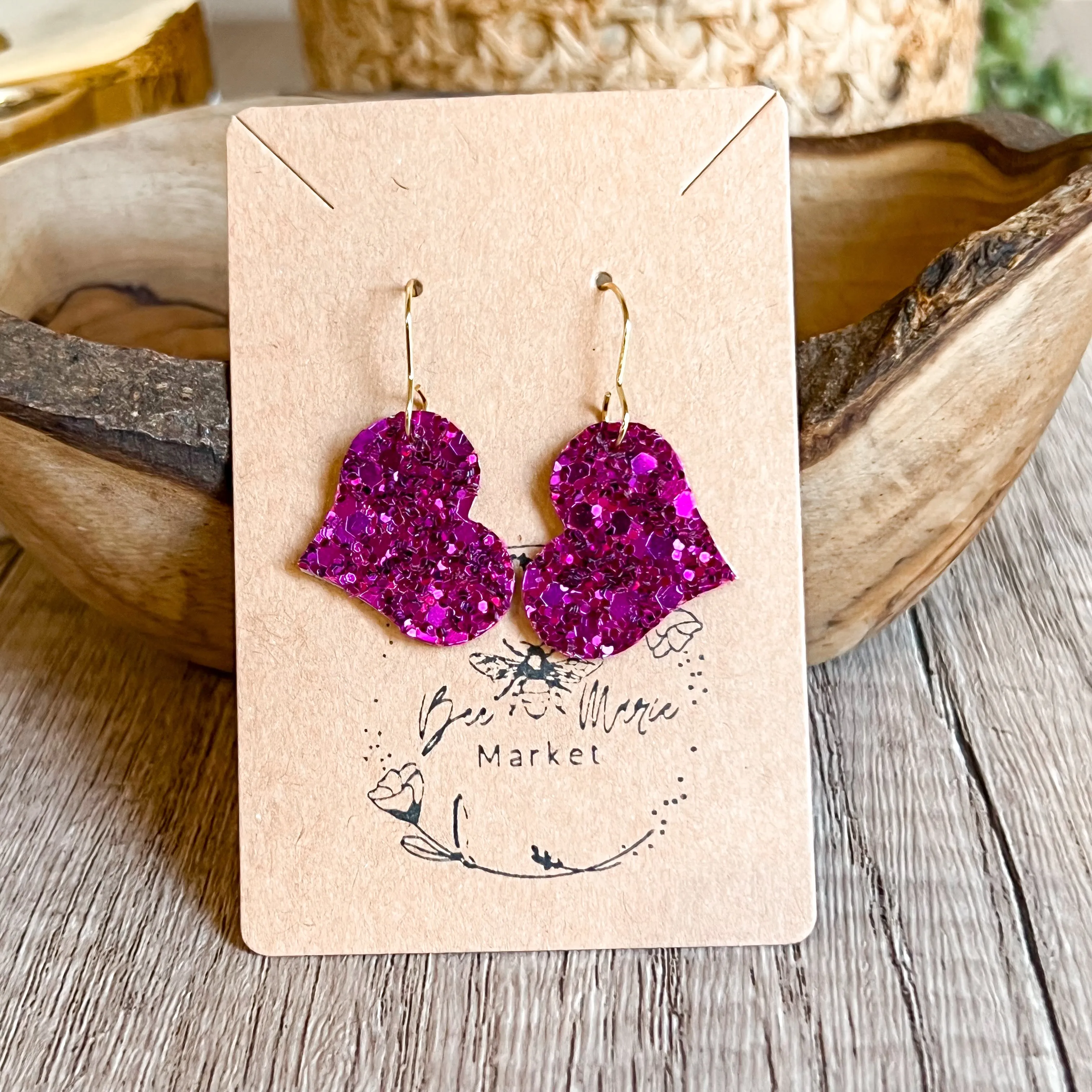 Riley Raspberry Glitter Heart Earrings sold by Roxie’s Picks