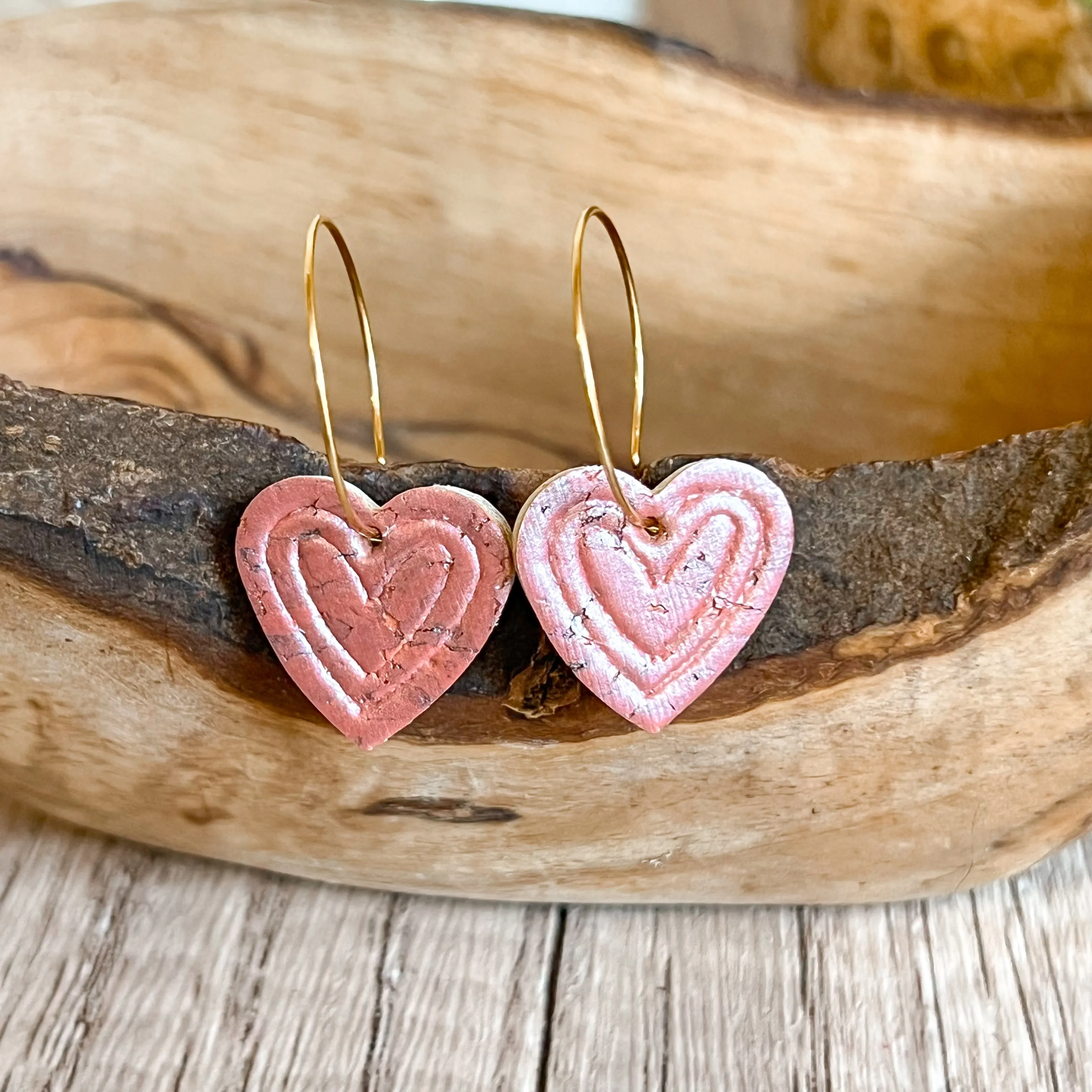 Karla Pearlized Embossed Heart Hoop Earrings sold by Roxie’s Picks