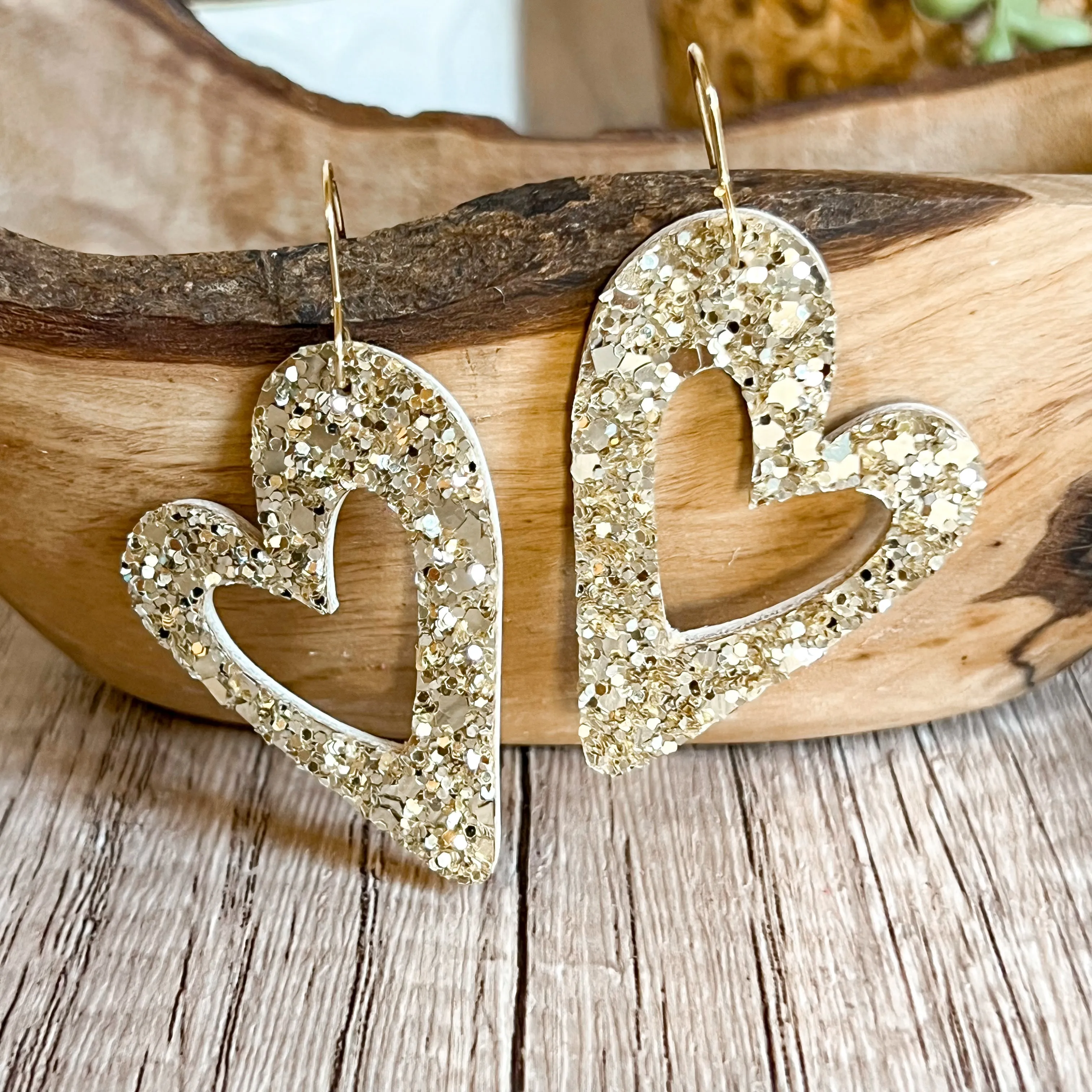 Holly Gold Glitter Open Heart Earrings sold by Roxie’s Picks
