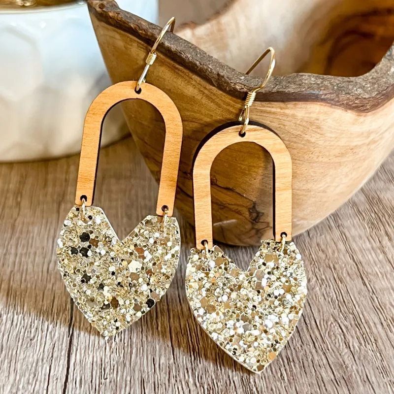 Gina Gold Glitter Heart Arch Earrings sold by Roxie’s Picks