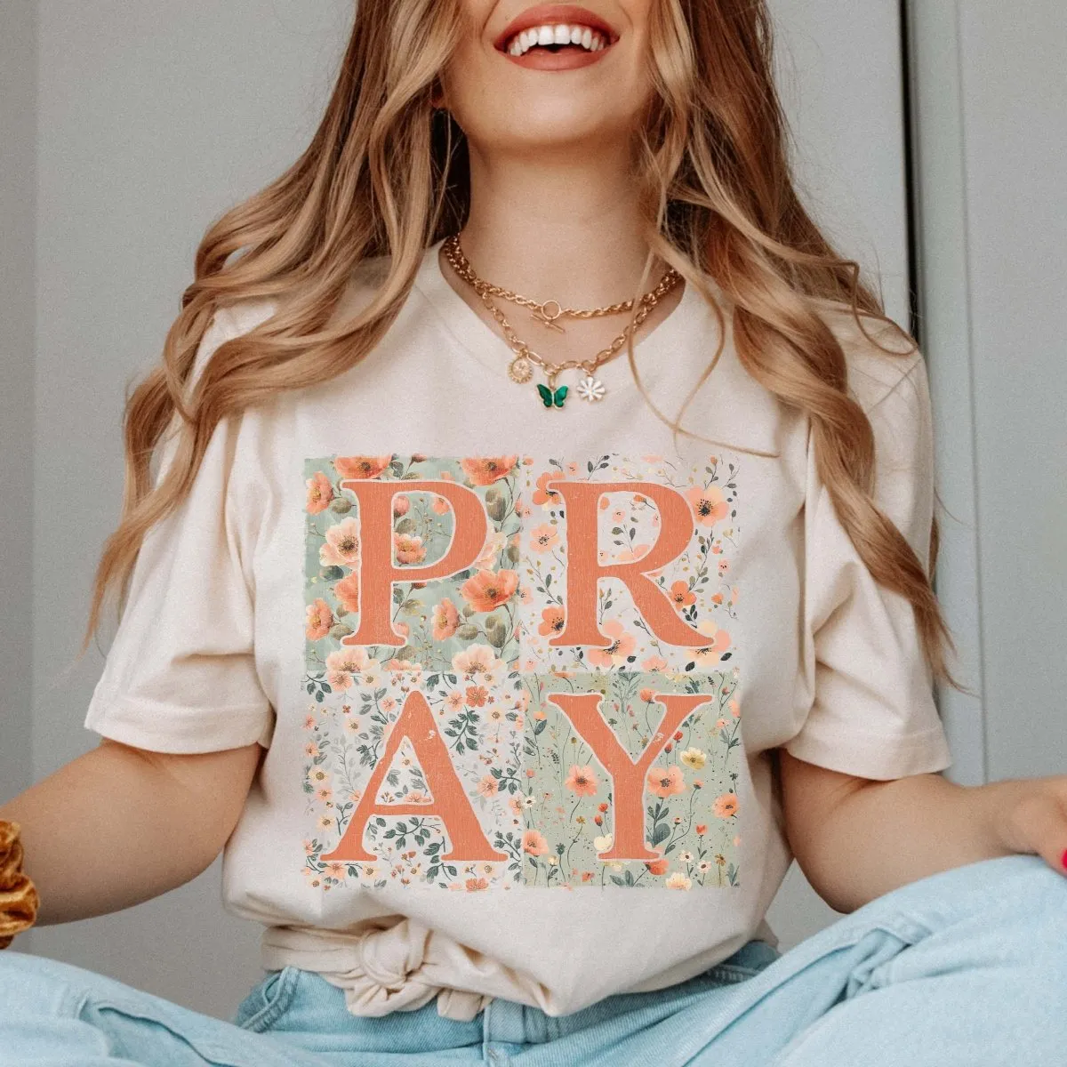 PRAY Floral Bella Graphic Tee sold by Roxie’s Picks