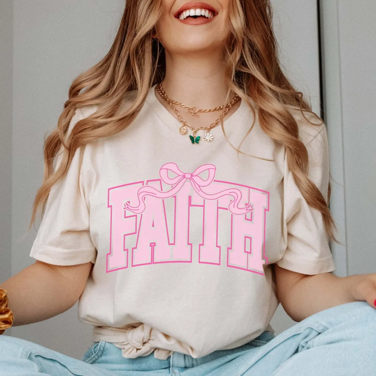 Faith Pink Bow Bella Graphic Tee sold by Roxie’s Picks product image thumbnail 2