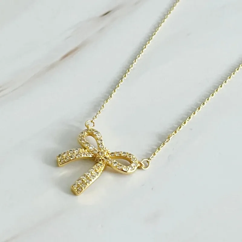Simply Shine Bow Necklace sold by Roxie’s Picks