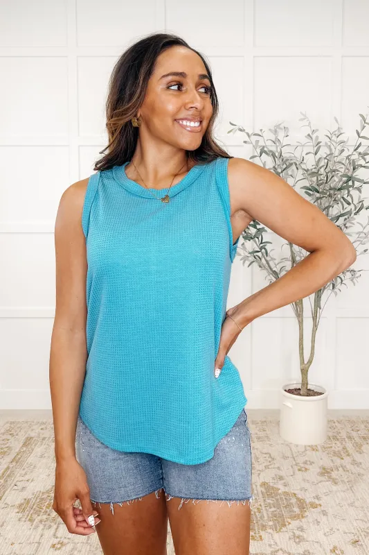 Thread Theory Round Neck Tank in Teal sold by Roxie’s Picks