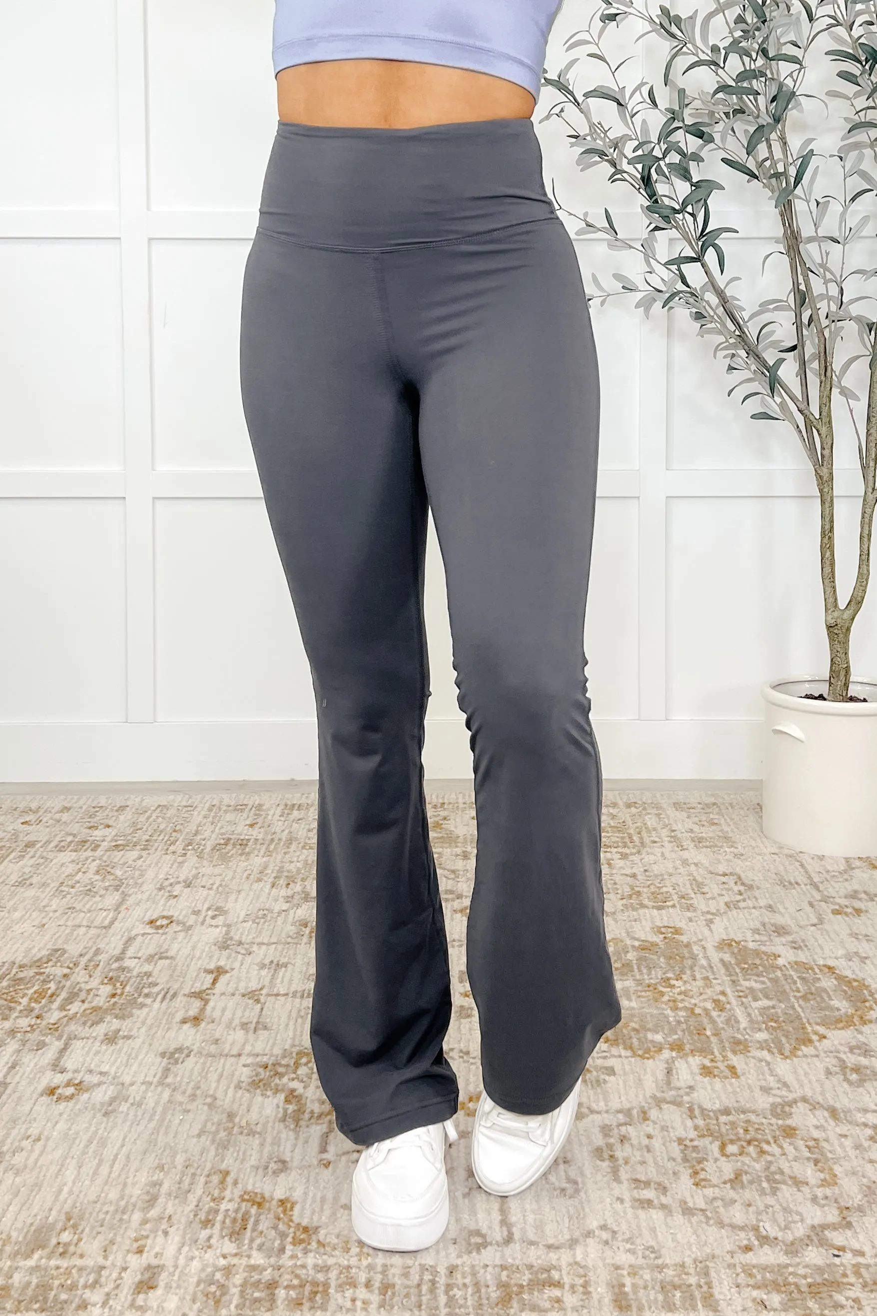 Motion Mastery Flared Yoga Pants in Titanium sold by Roxie’s Picks
