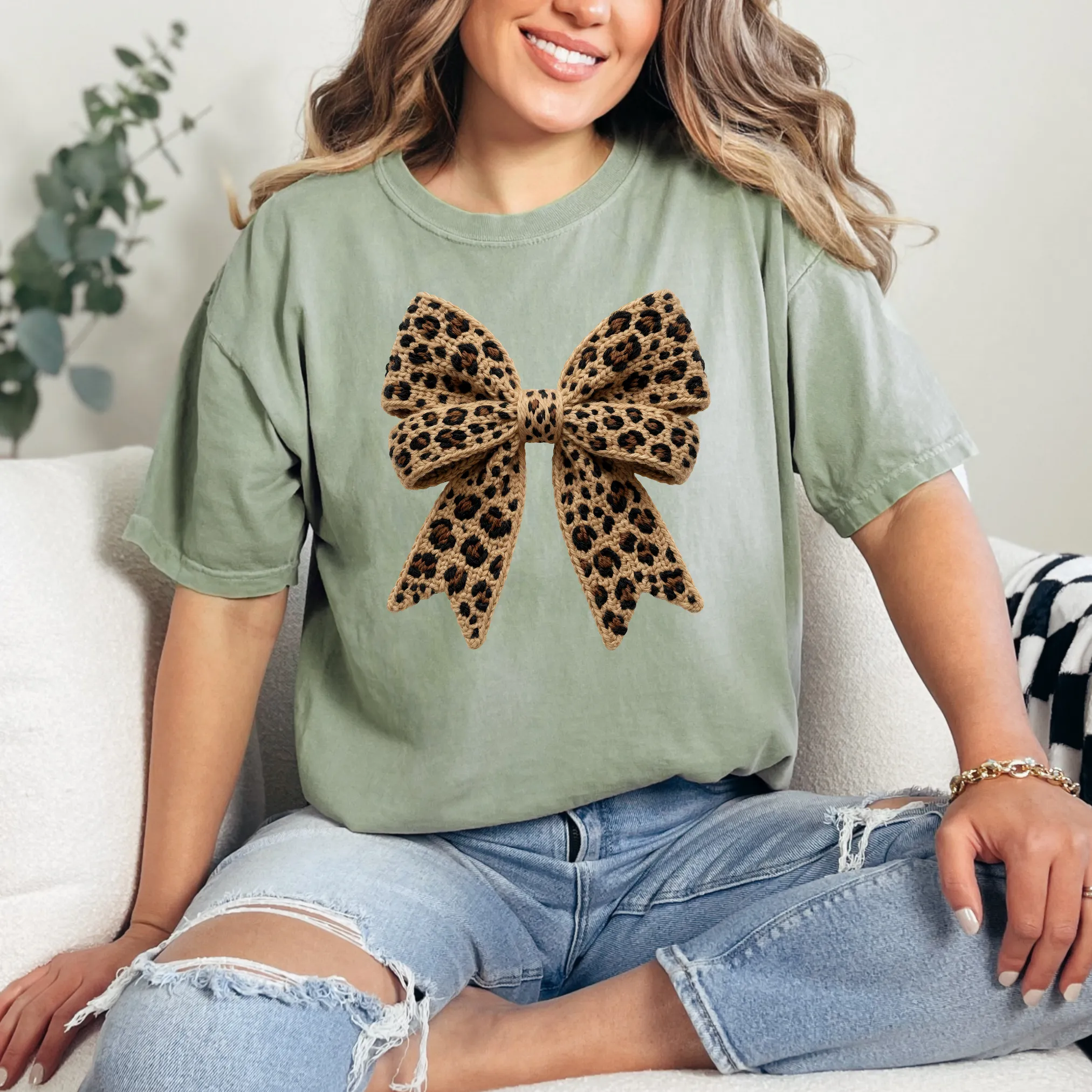 Leopard Bow in Stitches Graphic Tee sold by Roxie’s Picks