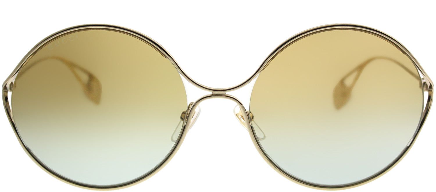 Gucci GG 0253S 005 Round Metal Gold Sunglasses with Gold Gradient Lens sold by Gaffos
