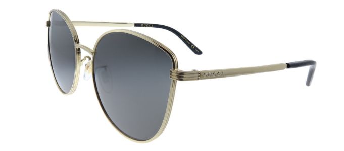 Gucci GG 0807SA 001 Round Metal Gold Sunglasses with Grey Lens sold by Gaffos