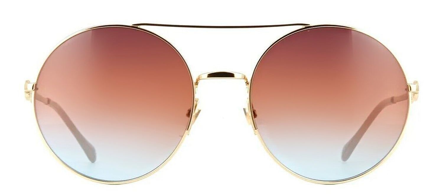 Gucci GG 0878S Round Metal Gold Sunglasses with Brown Gradient Lens sold by Gaffos