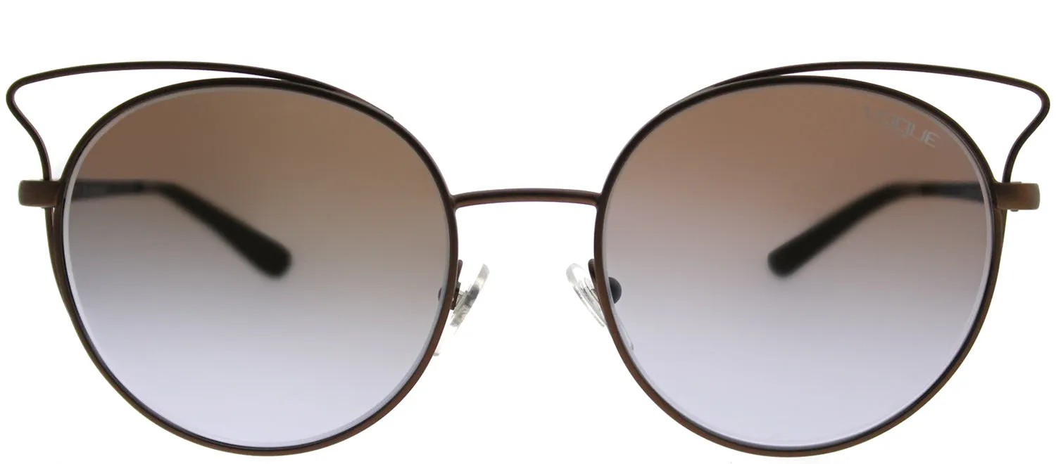 Vogue VO 4048S 5074B7 Cat-Eye Metal Brown Sunglasses with Violet Gradient Mirror Lens sold by Gaffos