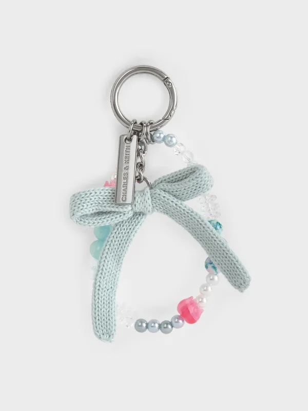 Charles & Keith - Crochet Bow Beaded Charm sold by Charles & Keith