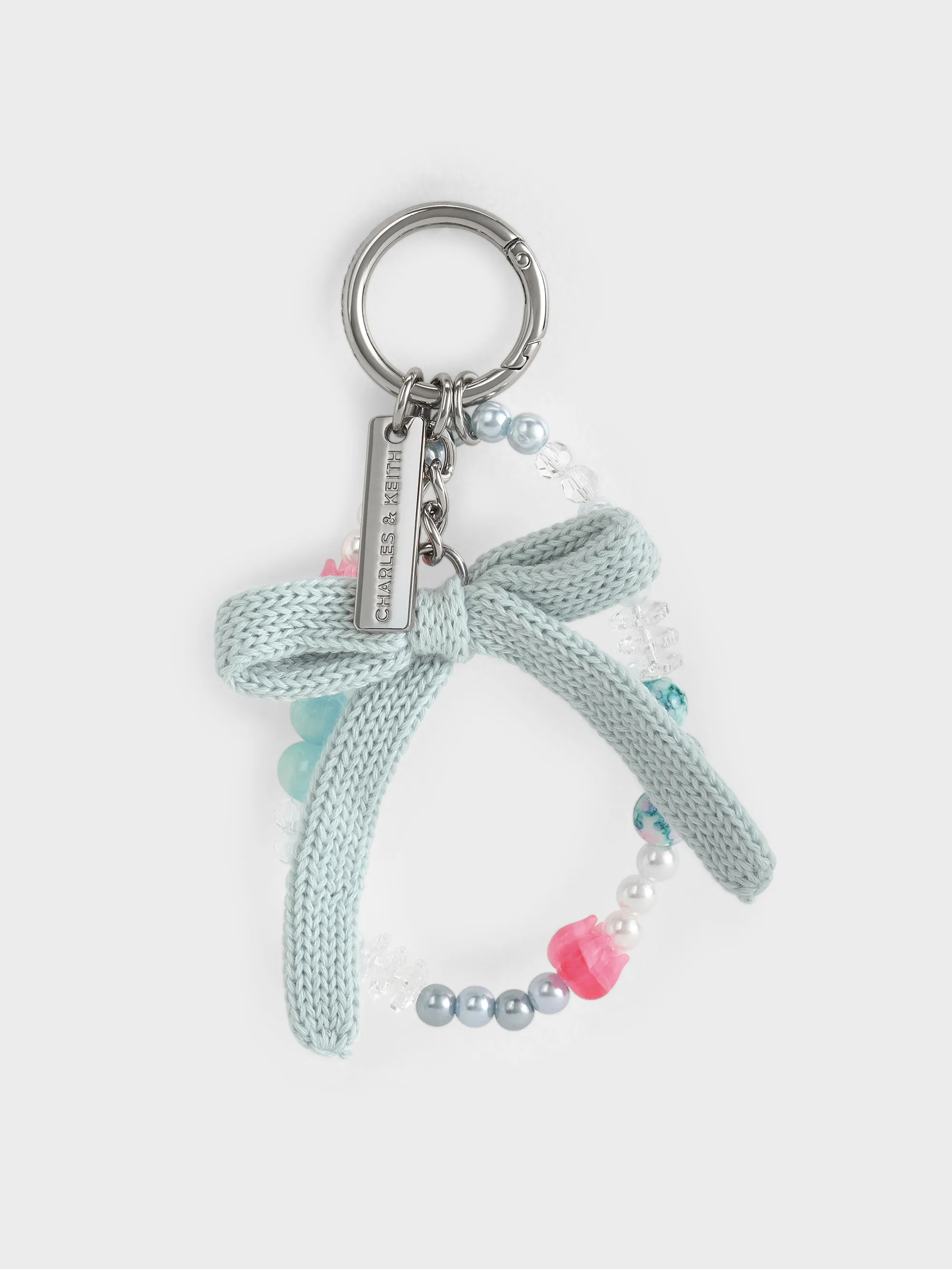 Charles & Keith - Crochet Bow Beaded Charm sold by Charles & Keith