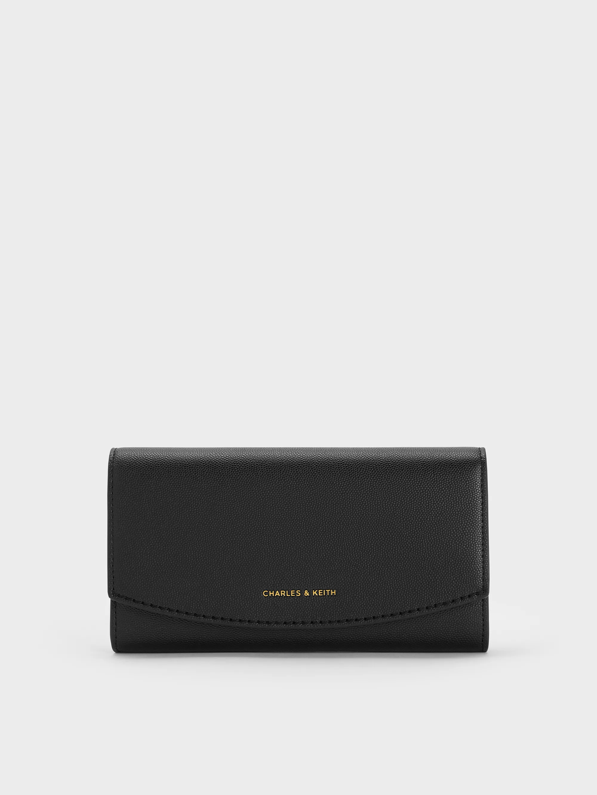 Charles & Keith - Briony Curved Flap Long Wallet sold by Charles & Keith