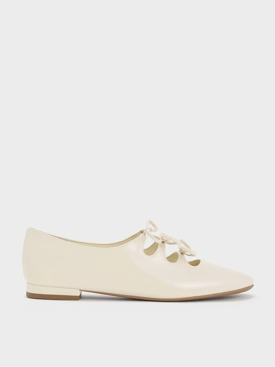 Charles & Keith - Dorri Patent Triple-Bow Ballet Flats sold by Charles & Keith