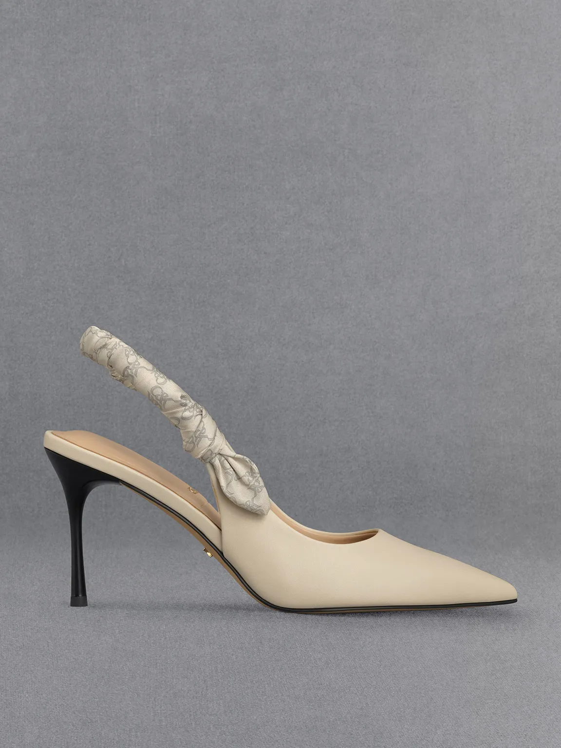 Charles & Keith - Tully Leather Ruched Print Slingback Pumps sold by Charles & Keith