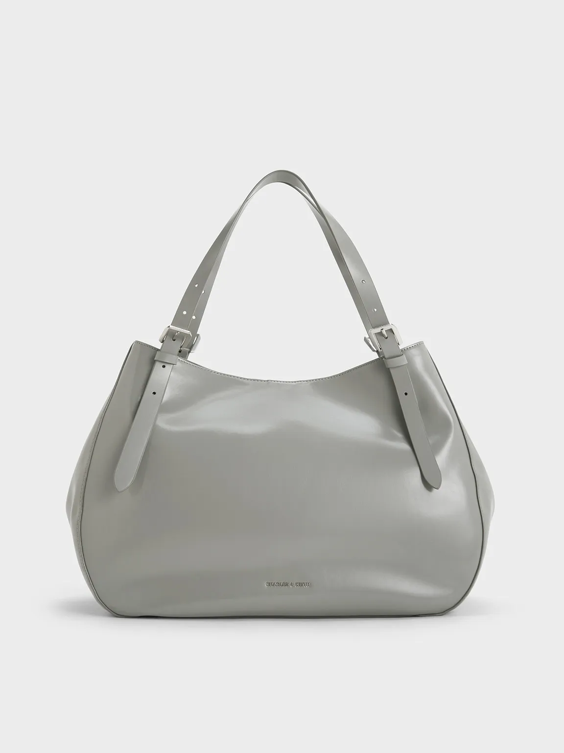 Charles & Keith - Buckle-Strap Slouchy Tote Bag sold by Charles & Keith