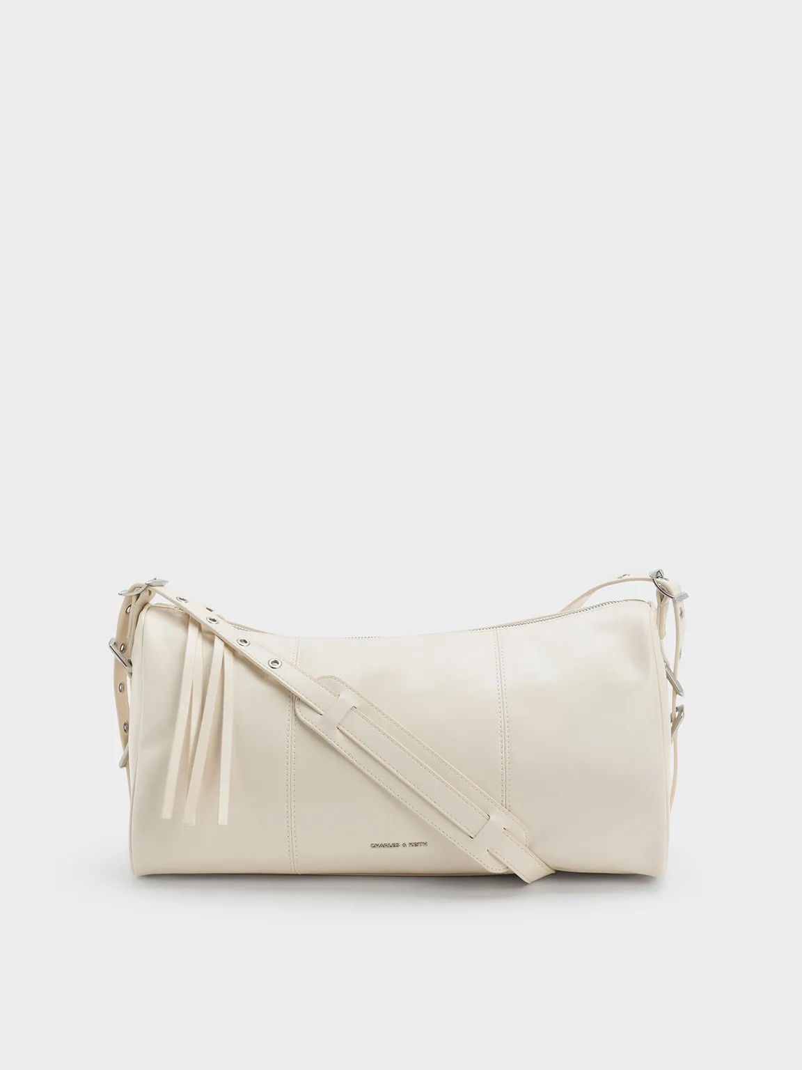 Charles & Keith - Bryna Panelled Grommet-Strap Crossbody Bag sold by Charles & Keith