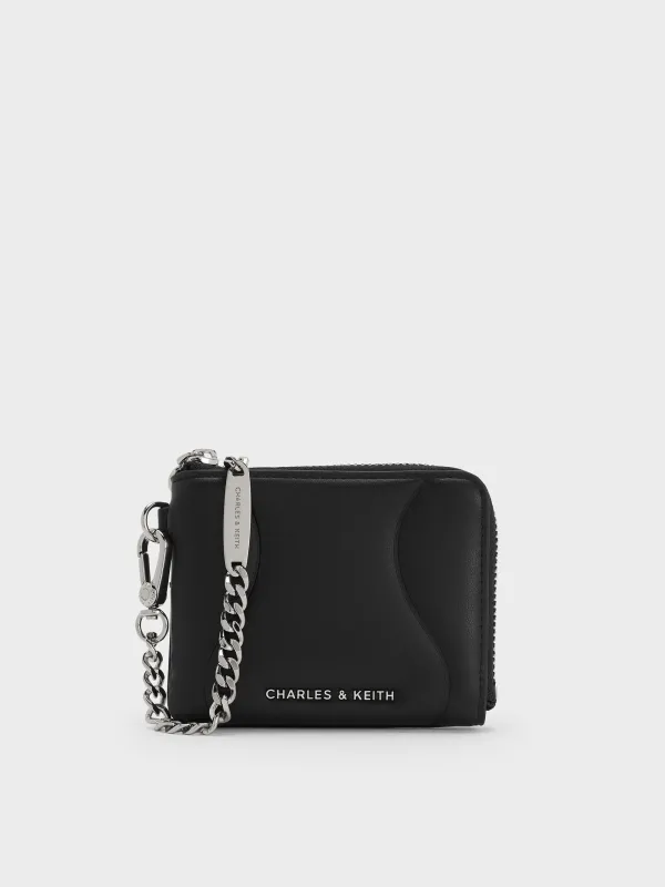 Charles & Keith - Nelly Wavy-Panel Chain-Strap Wristlet sold by Charles & Keith