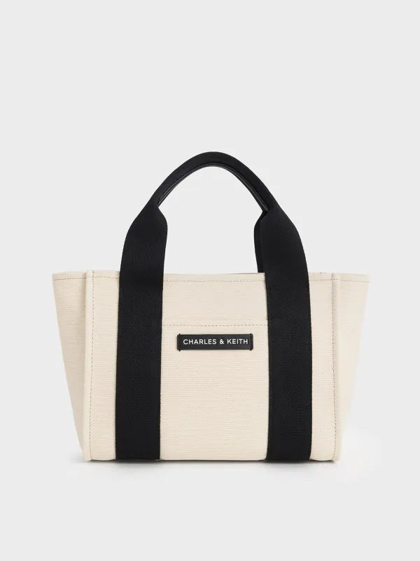 Charles & Keith - Kay Canvas Tote Bag sold by Charles & Keith