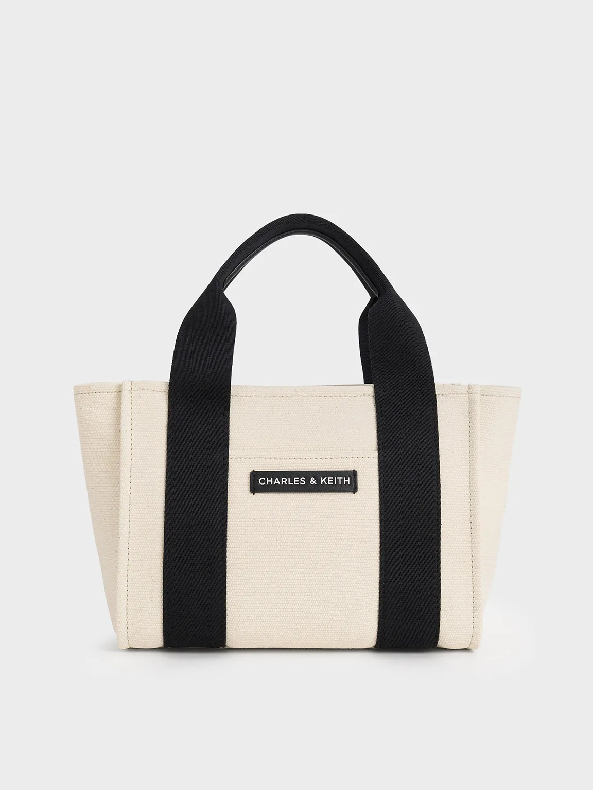 Charles & Keith - Kay Canvas Tote Bag sold by Charles & Keith