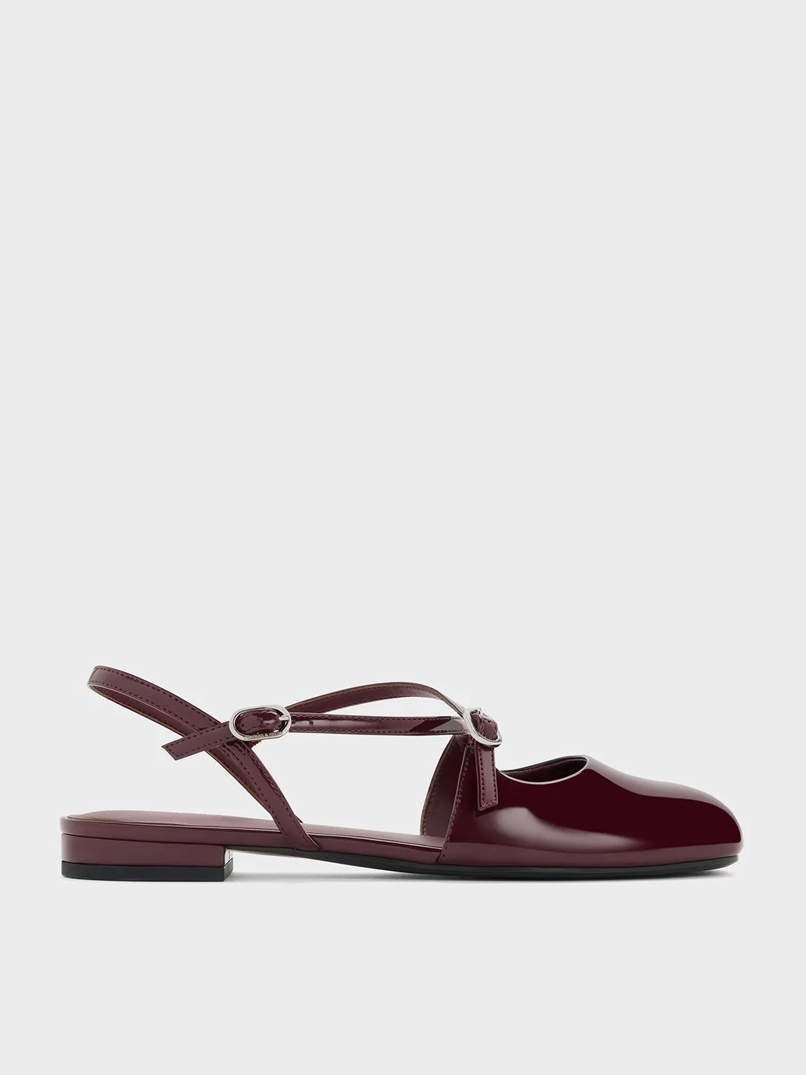 Charles & Keith - Patent Crossover Buckled Slingback Flats sold by Charles & Keith