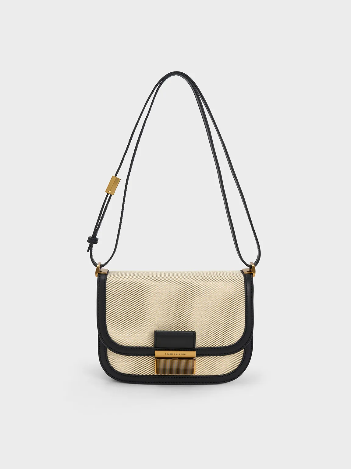 Charles & Keith - Charlot Canvas Crossbody Bag sold by Charles & Keith