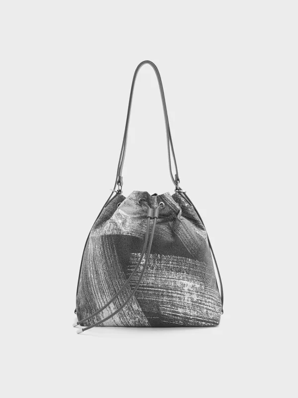 Charles & Keith - Neva Brushed Denim Two-Way Bucket Bag sold by Charles & Keith