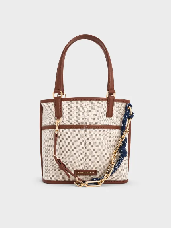 Charles & Keith - Addison Canvas Knotted-Rope Reversible Tote Bag sold by Charles & Keith