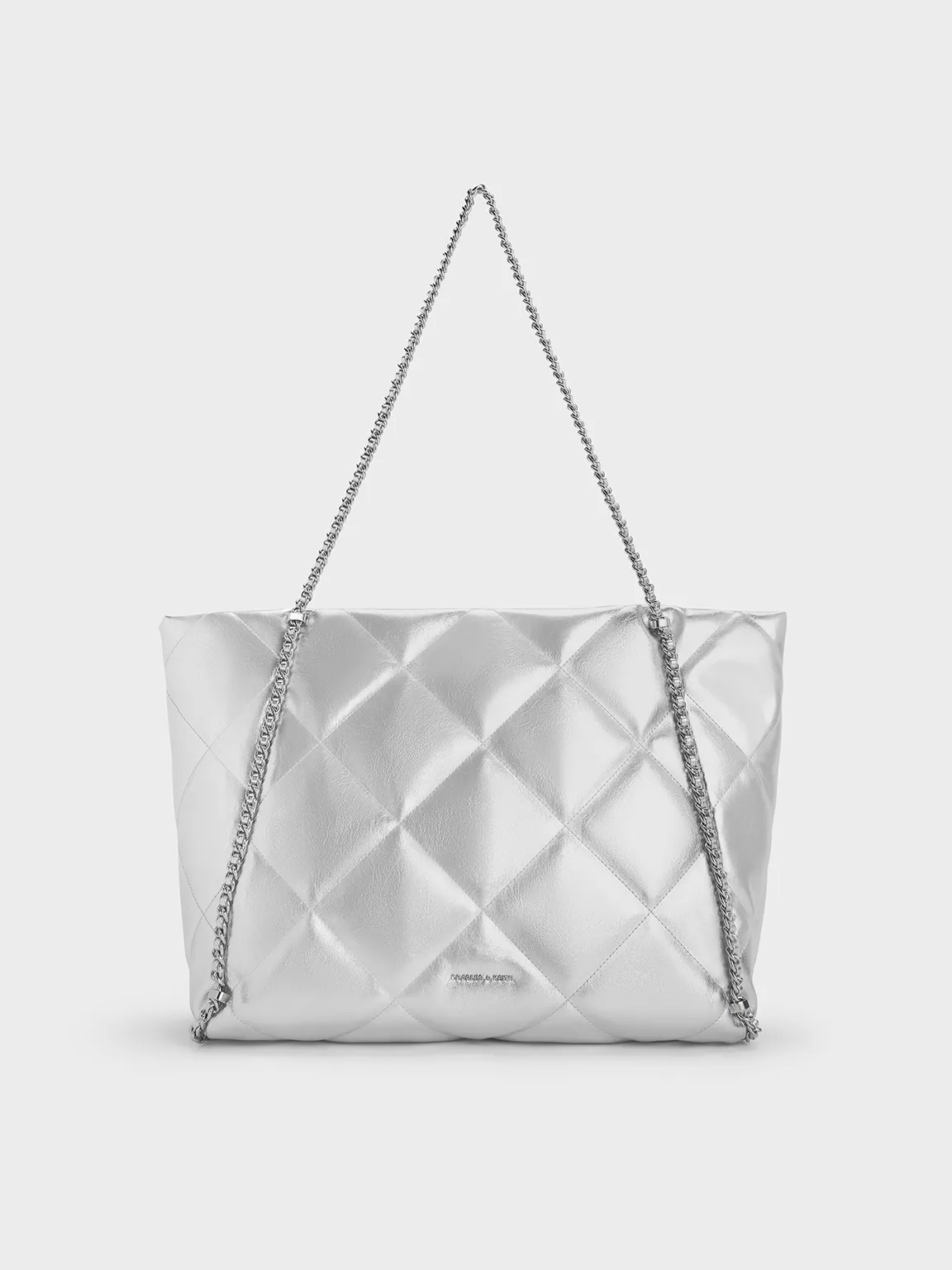 Charles & Keith - Apfra Metallic Quilted Chain-Embellished Tote Bag sold by Charles & Keith