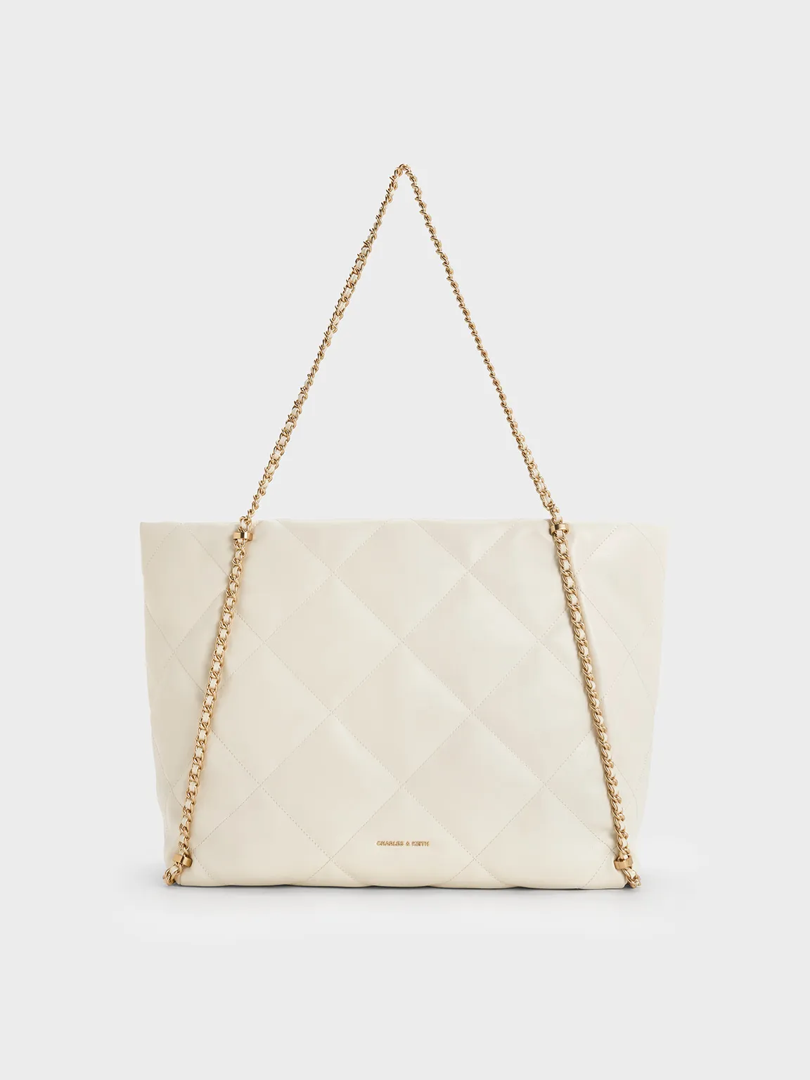 Charles & Keith - Apfra Quilted Chain-Embellished Tote Bag sold by Charles & Keith