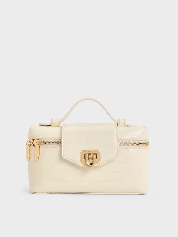 Charles & Keith - Arwen Croc-Effect Top Handle Vanity Bag sold by Charles & Keith