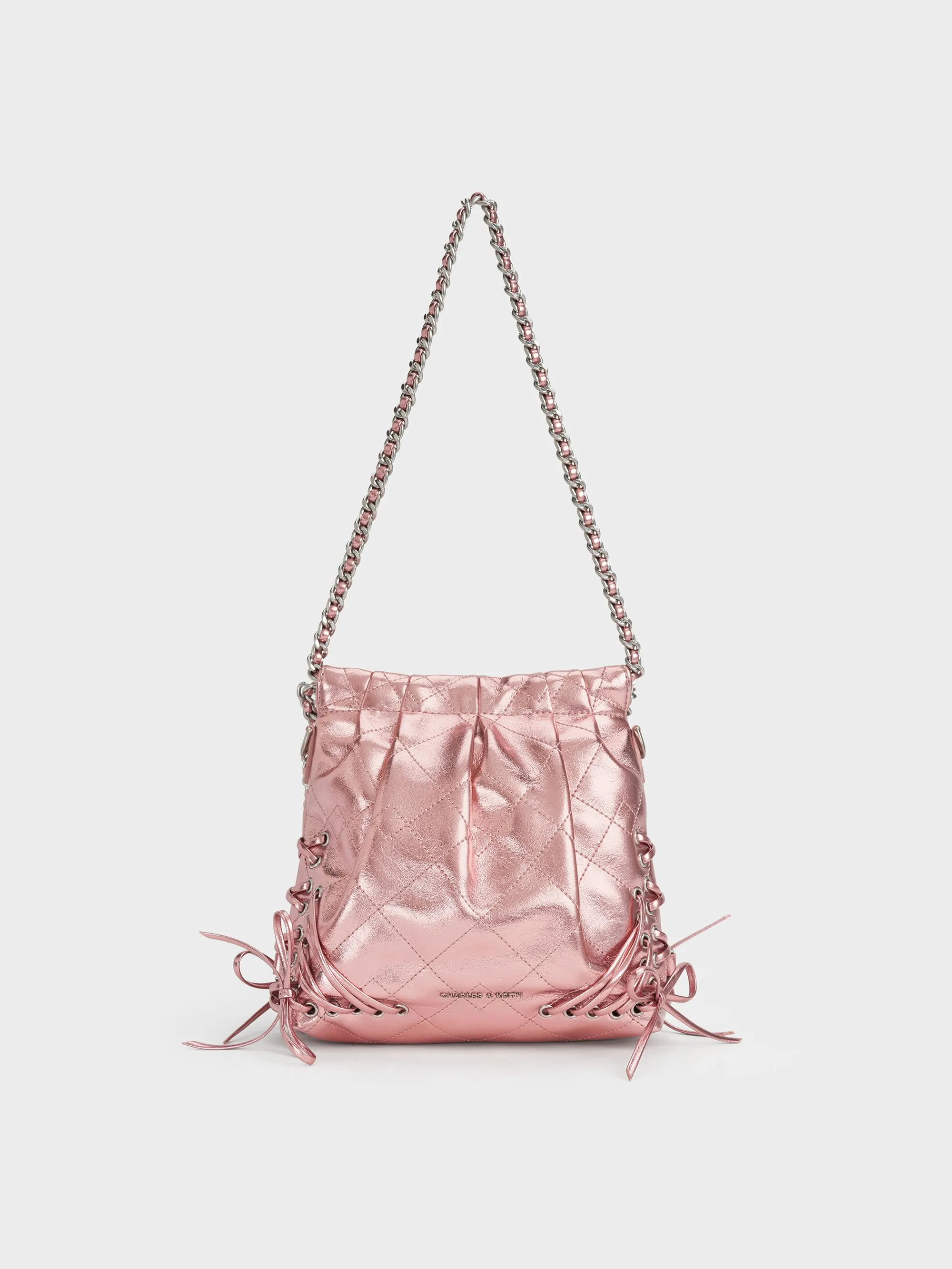 Charles & Keith - Duo Metallic Grommet Chain-Handle Two-Way Backpack sold by Charles & Keith