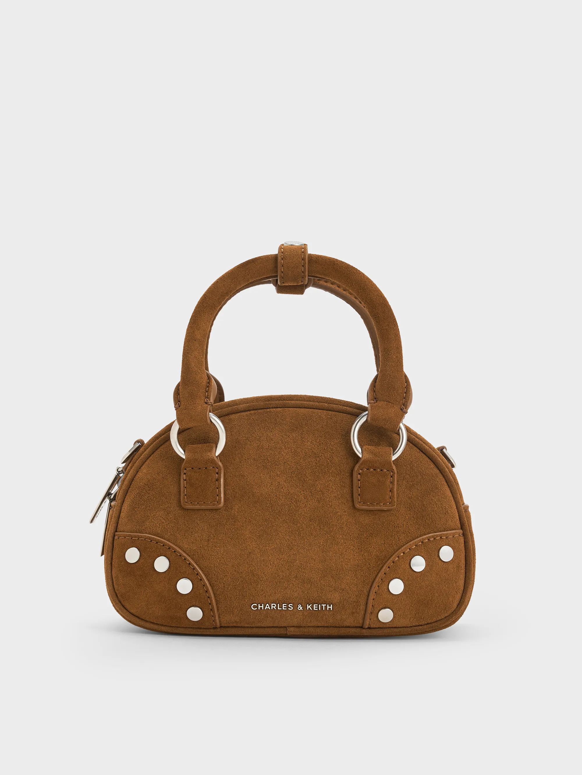Charles & Keith - Bobbie Studded Top Handle Bag sold by Charles & Keith