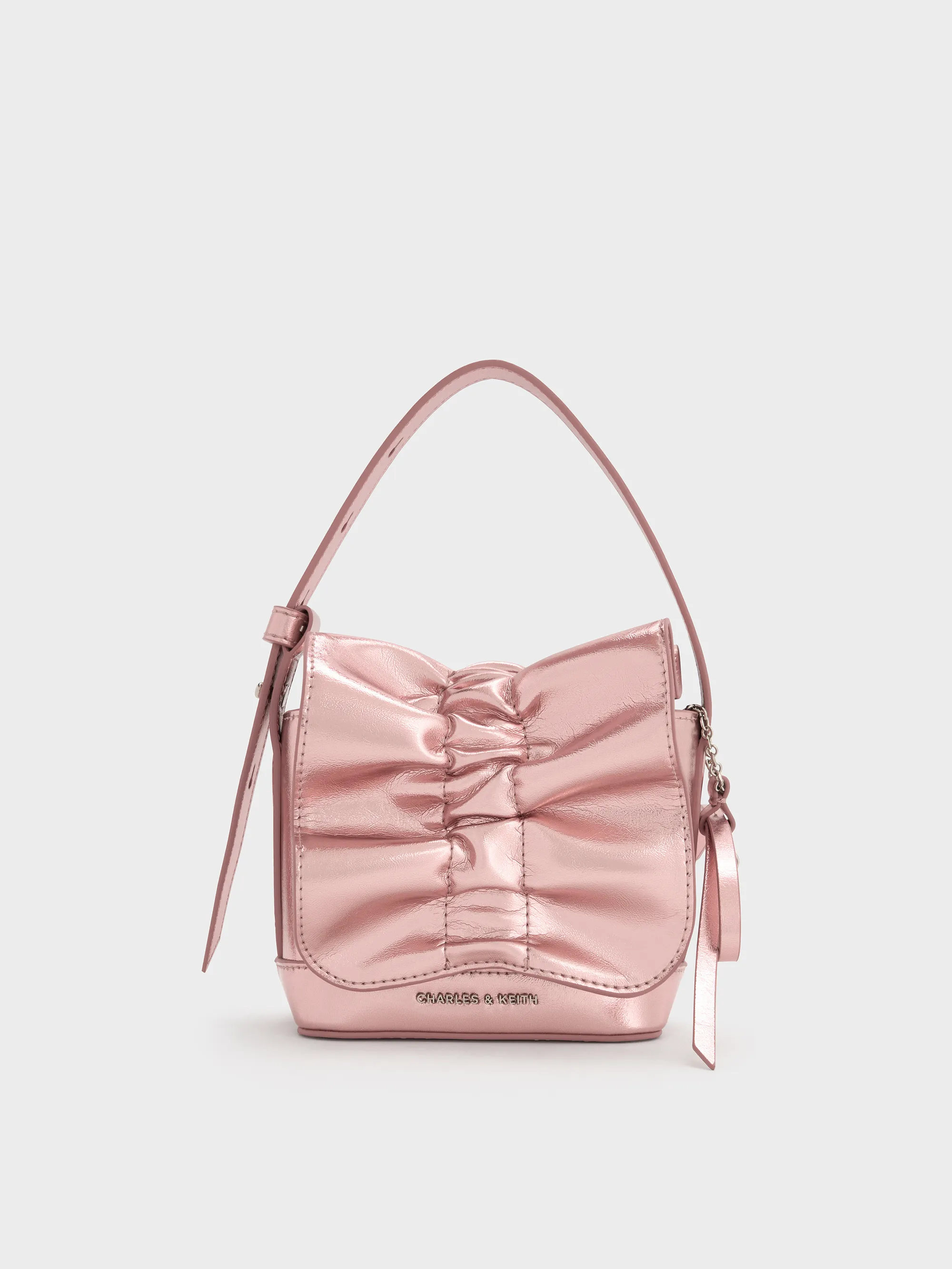 Charles & Keith - Kadee Metallic Bow-Charm Ruched Mini Bag sold by Charles & Keith