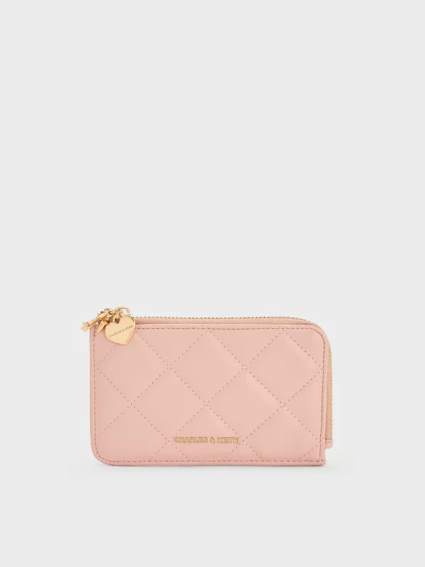 Charles & Keith - Arrietty Quilted Bow-Heart Charm Zip-Around Wallet sold by Charles & Keith